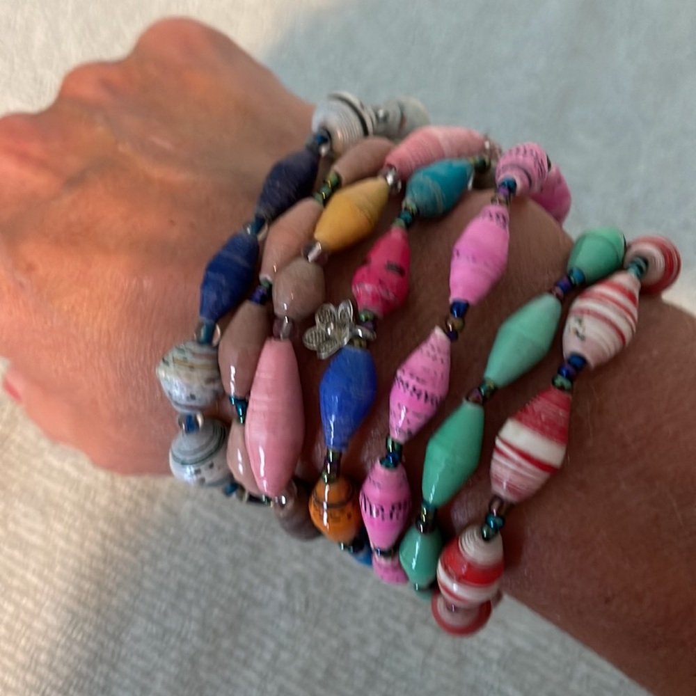 Stretch bracelets made from the park maps at Walt Disney World.